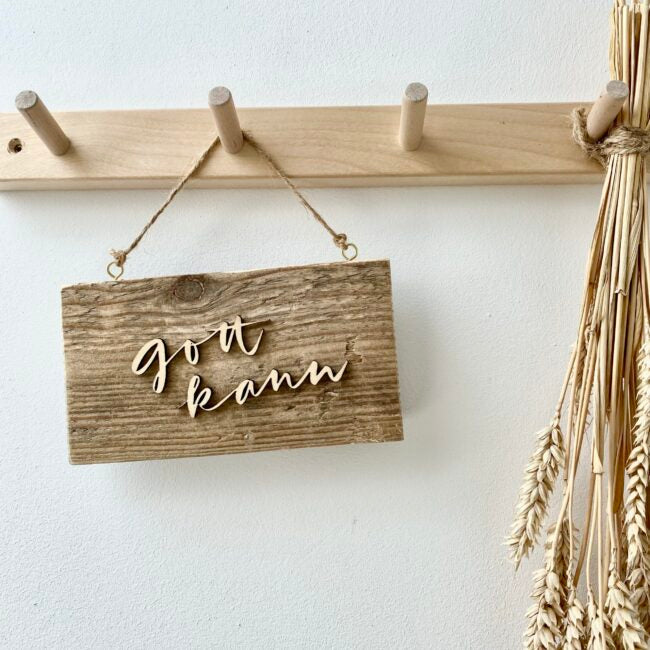 Holzschild „gott kann“